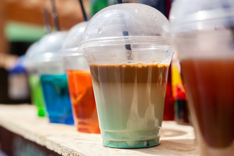 Cold soft drink with ice and straw